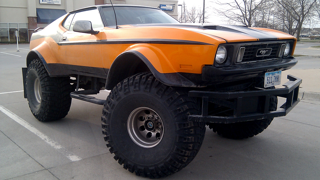 Jacked Up Mustang On Boggers .jpg